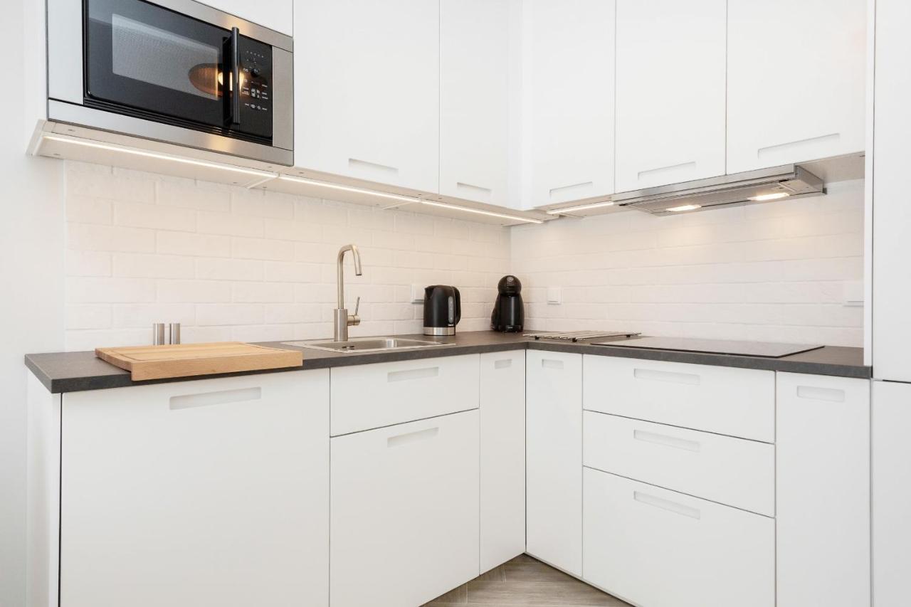 Apartments Rondo Wiatraczna By Noclegi Renters Varsó Kültér fotó